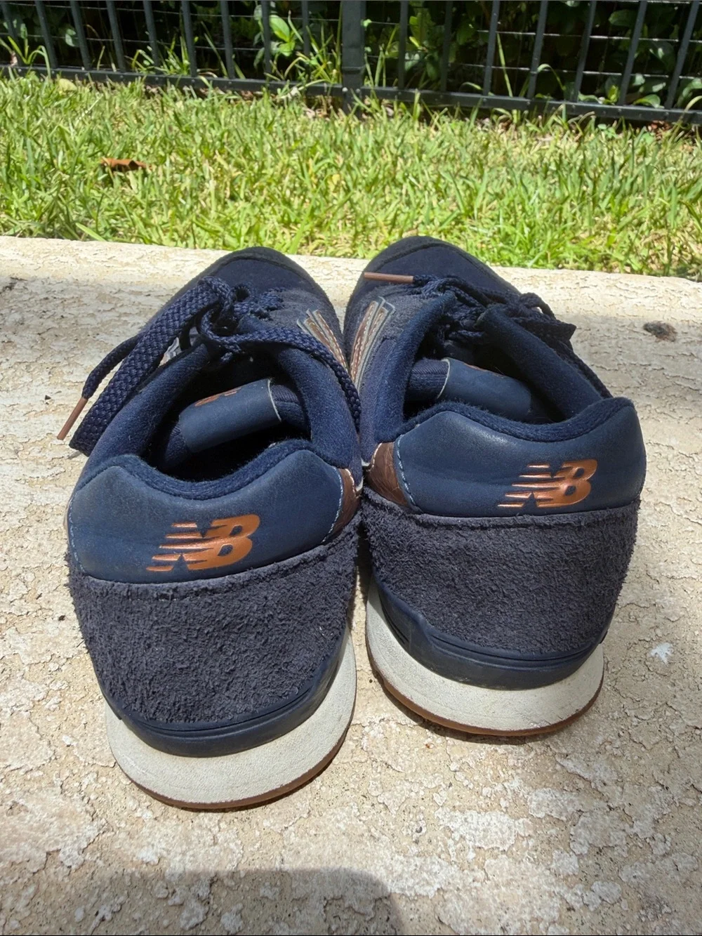 New Balance Women's Navy Sneakers with Metallic Rose Accents